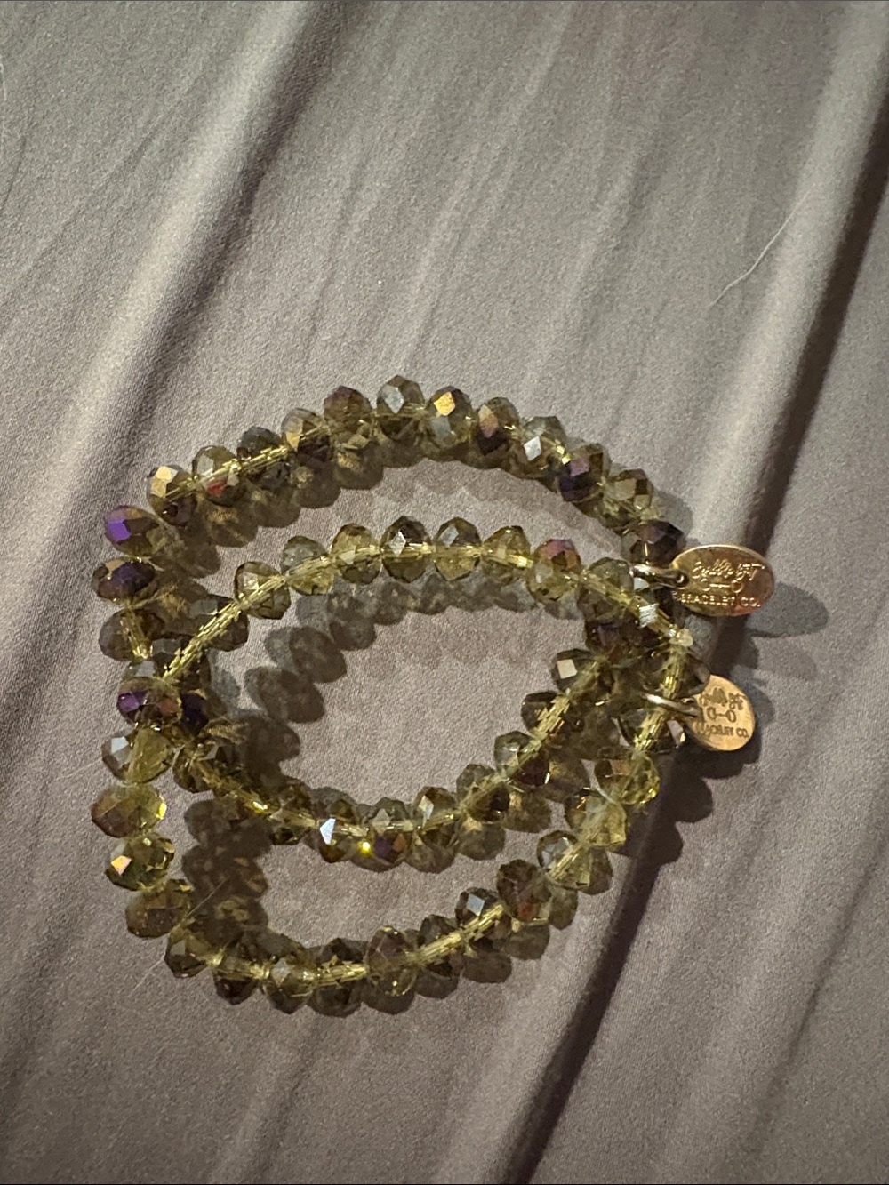 Snaffle Bit Bracelet Company set of 2 olive green bracelets *like new*